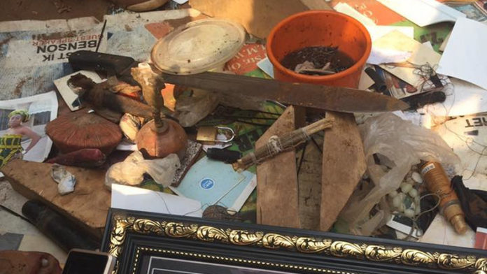 Shock As Police Storm Popular Church, Dig Up Altar For Fetish Items