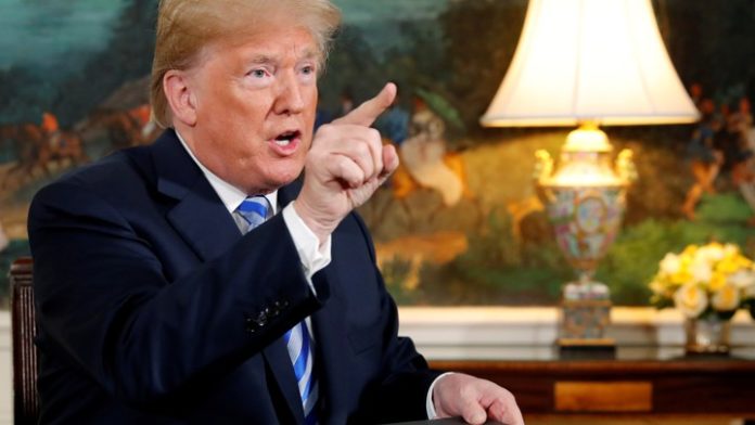 FILE PHOTO: Trump delivers remarks on his intentions regarding the Iran nuclear deal at the White House US vs Iran: President Trump issues strong threat, warning to Iraq