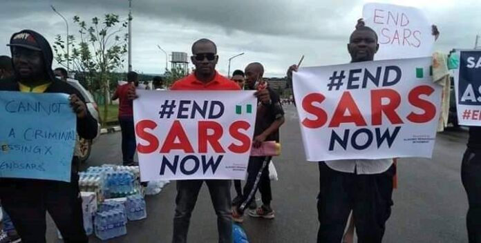 #EndSARS: Armed Hunters Give Security Cover To Protesters In Osogbo